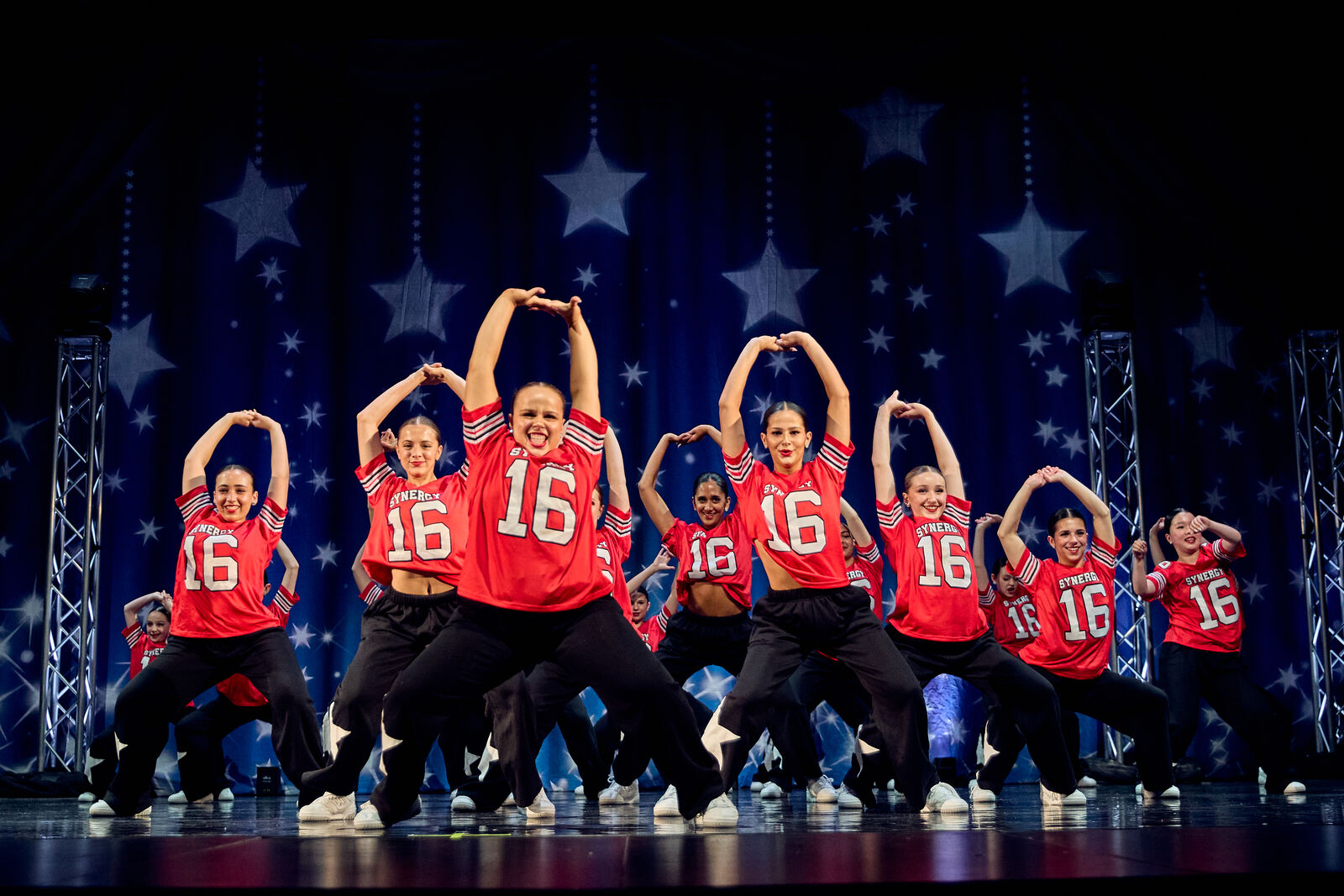 AFDS hip hop team performing in red jerseys